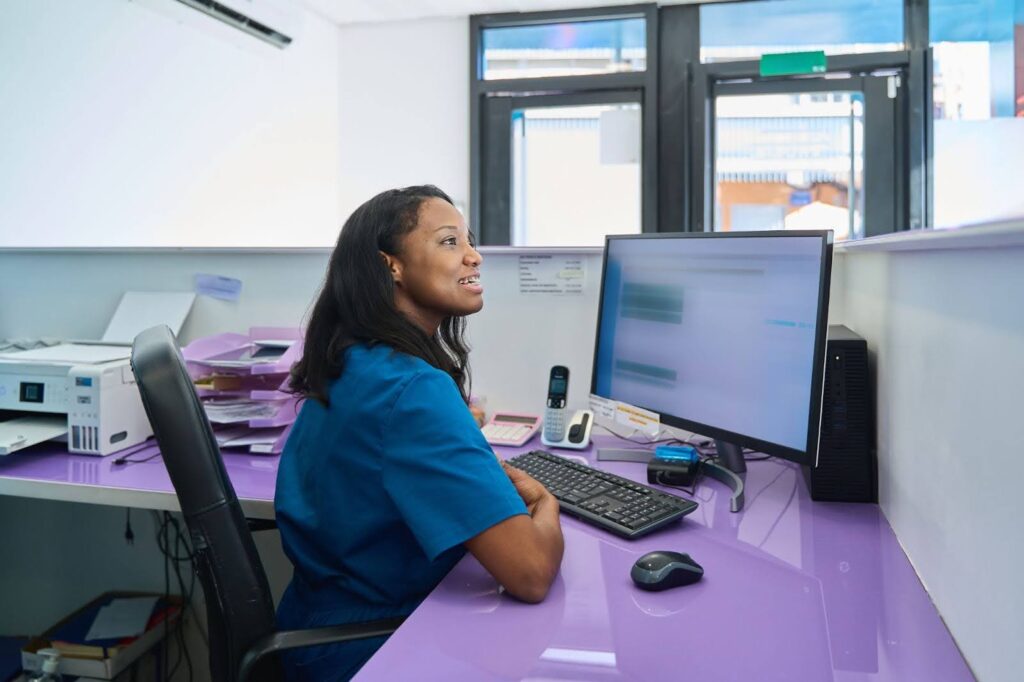 African medical secretary at work