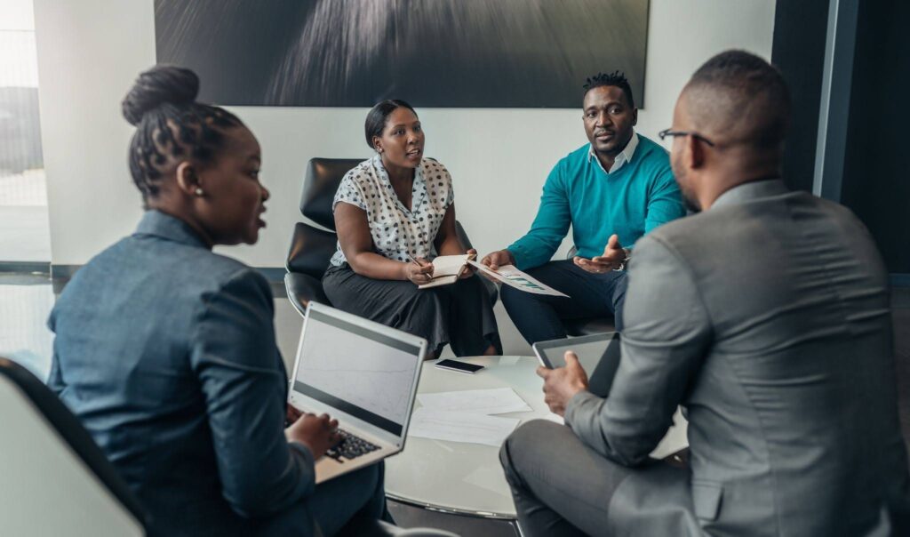 An African team discussing a business strategy in their office