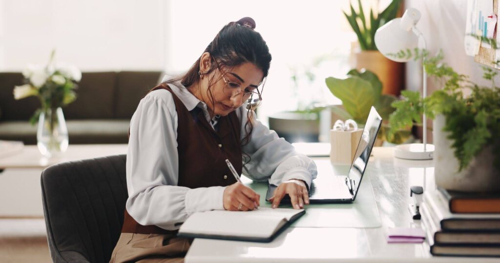 A female outsourced specialist from the Dominican Republic working in an office