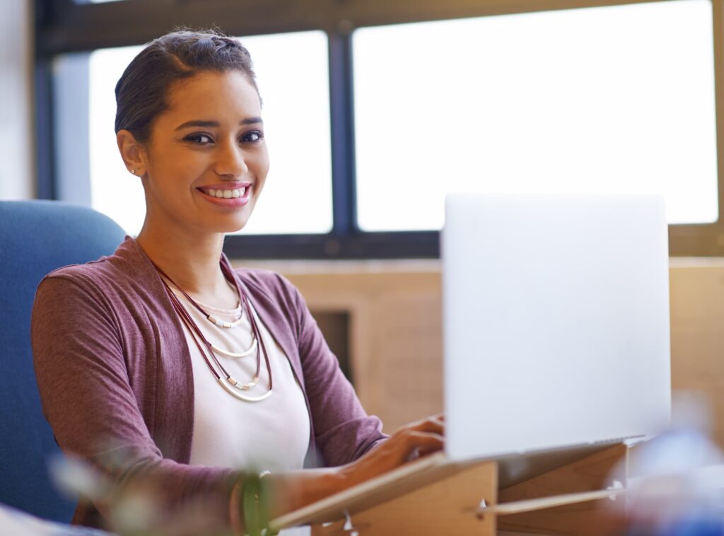 Lady agent smiling — Top BPO Solutions | Outsourcing Services In The Philippines
