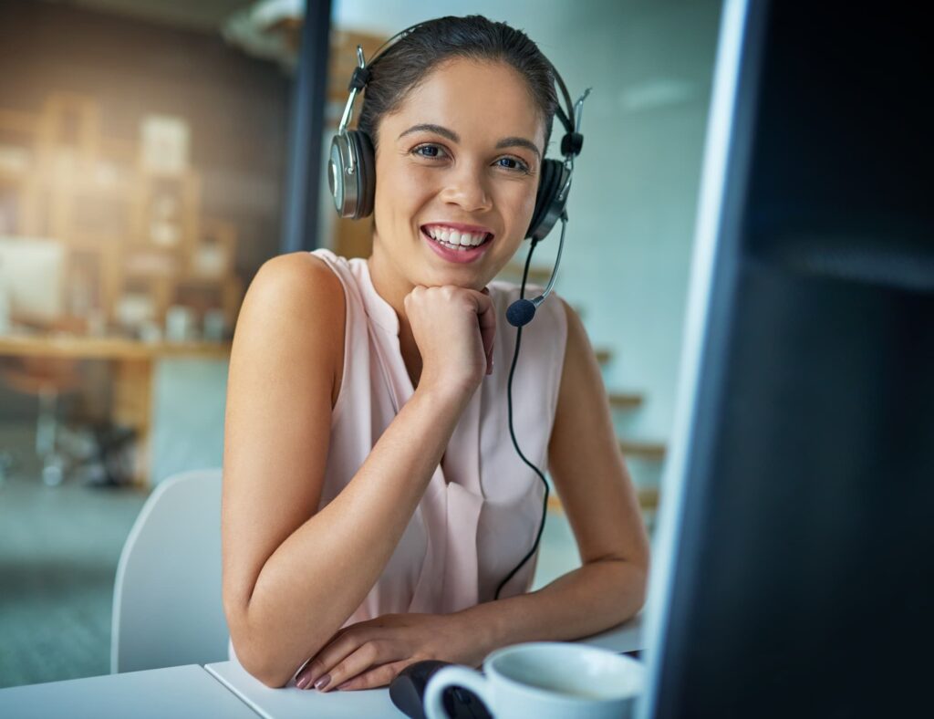 Smiling lady customer service agent — Top BPO Solutions | Outsourcing Services In The Philippines