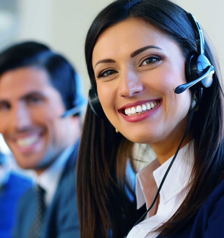Lady wearing headset smiling — Top BPO Solutions | Outsourcing Services In The Philippines