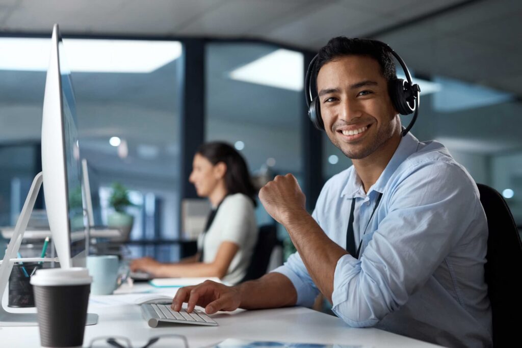 Happy customer service agent — Top BPO Solutions | Outsourcing Services In The Philippines