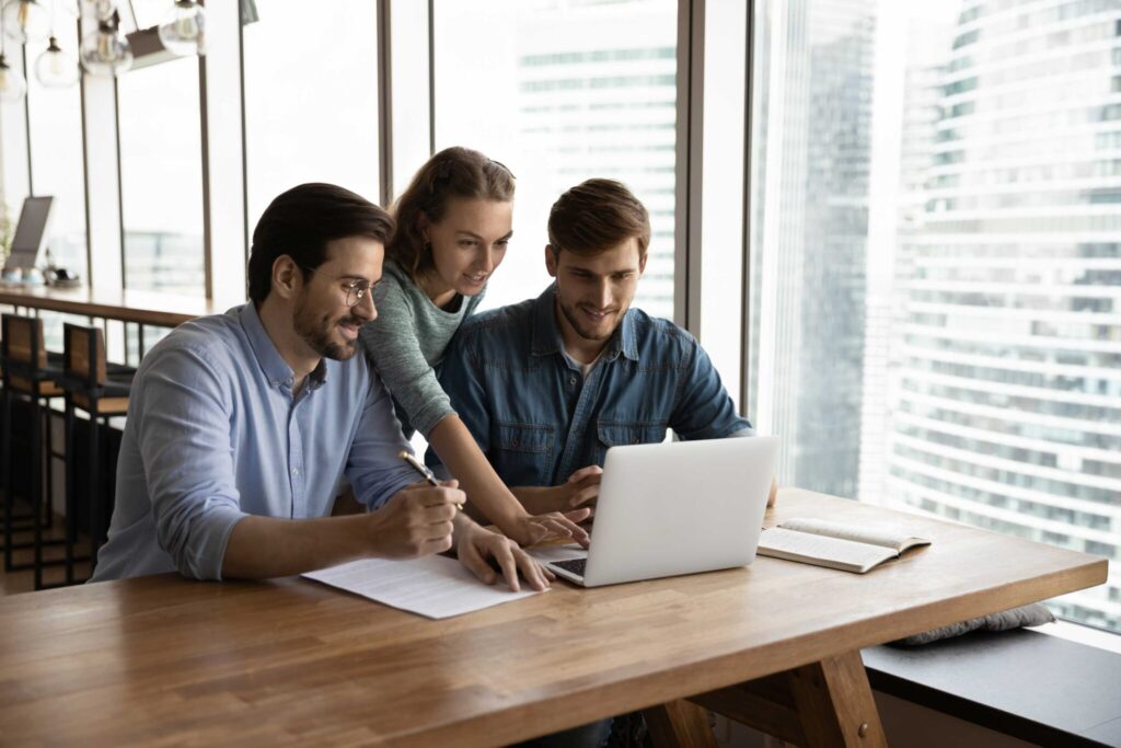Team helping each other — Top BPO Solutions | Outsourcing Services In The Philippines