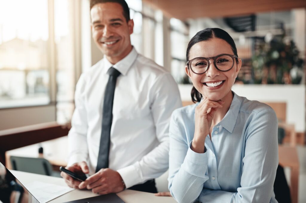 Content writers smiling — Top BPO Solutions | Outsourcing Services In The Philippines