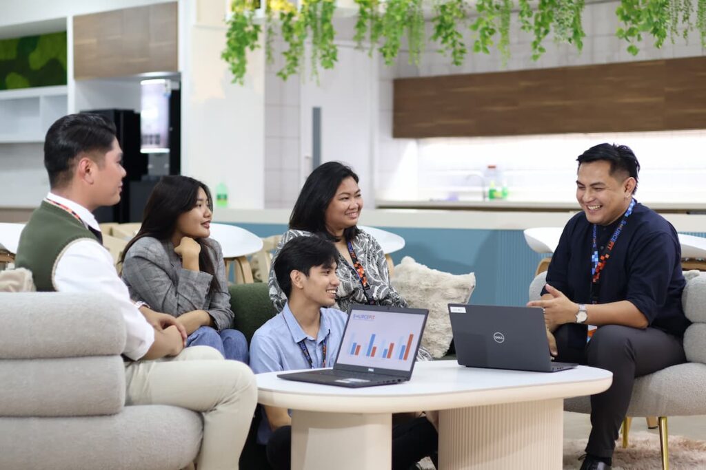 Happy team discussion — Business process outsourcing & offshore staffing | Sourcefit