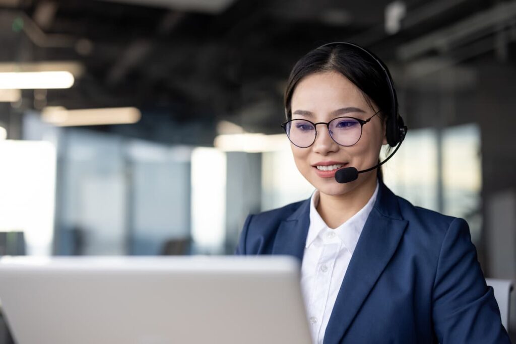 Sourcefit staff talking with client online — Business process outsourcing & offshore staffing | Sourcefit