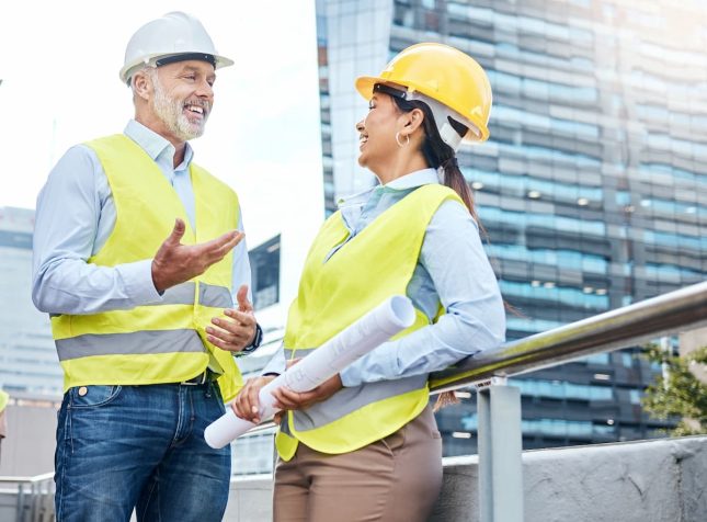 Shot of two business people working together