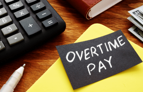 Text sign showing hand written words Overtime pay